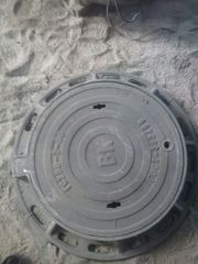 Люки чугунные канализационные с запорным устройством