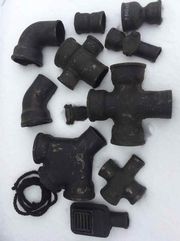 Трубы чугунные и фасонные части к ним                          